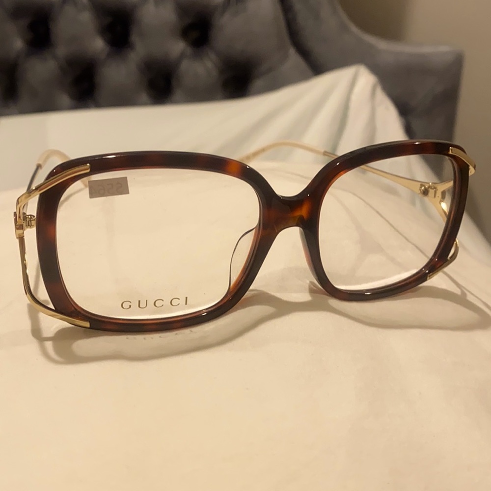 Gucci glasses , never worn does not fit my face frame NWOT,may add prescription